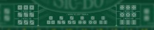 Sic bo table with triple bets in focus.