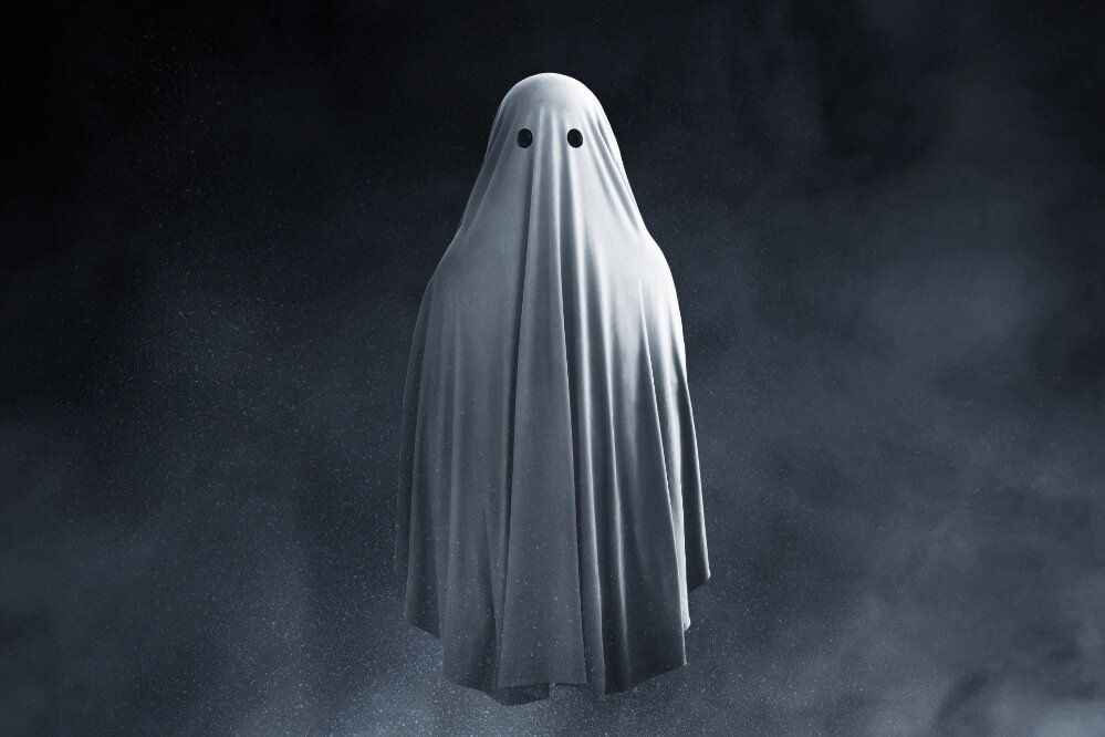 Scary ghost on dark background